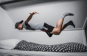 man jump to bed